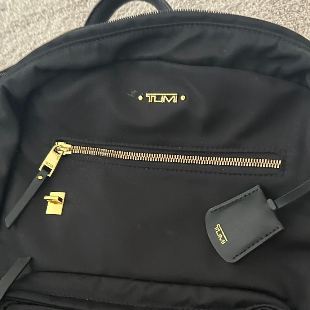 Tumi Black Backpack with Gold Hardware